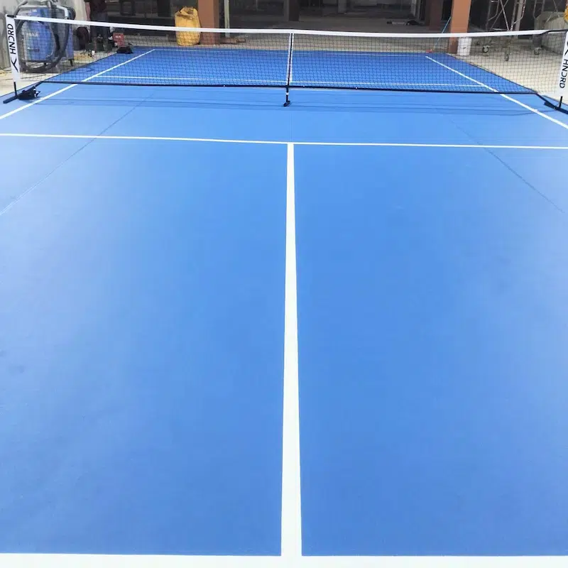 Lapangan pickleball vinyl sand biru 3mm di Cengkareng, Jakarta Barat setelah pemasangan oleh Kawan Sport Indonesia, Juli 2026